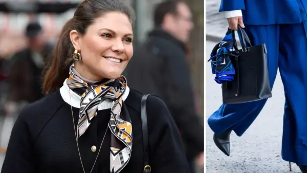 Kronprinsessan Victoria visar hur man snyggt kan knyta scarf runt halsen, matchat med en elegant svart kofta.